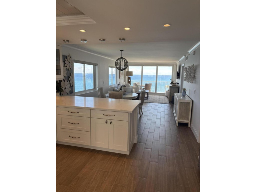 WALK INTO THIS BEAUTIFUL AND UNIQUE OCEANFRONT CORNER 2/2 - Beach Condo for sale in Highland Beach, Florida on Beachhouse.com