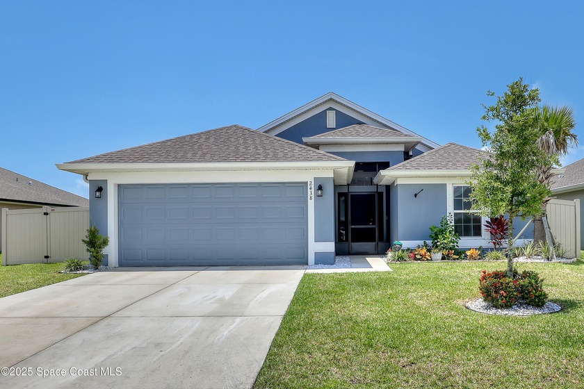 WATERFRONT STUNNER WITH MAJOR UPGRADES! Breathtaking sunset on - Beach Home for sale in Palm Bay, Florida on Beachhouse.com