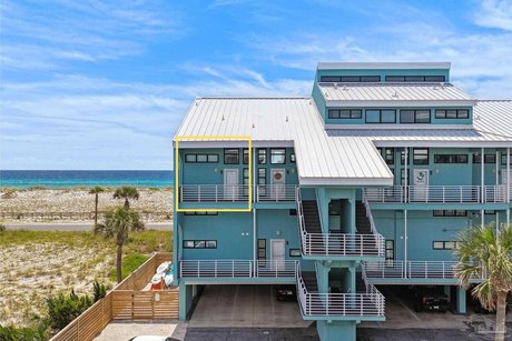 Prepare to fall in love with this stunning bi-level unit at Palm - Beach Home for sale in Pensacola Beach, Florida on Beachhouse.com