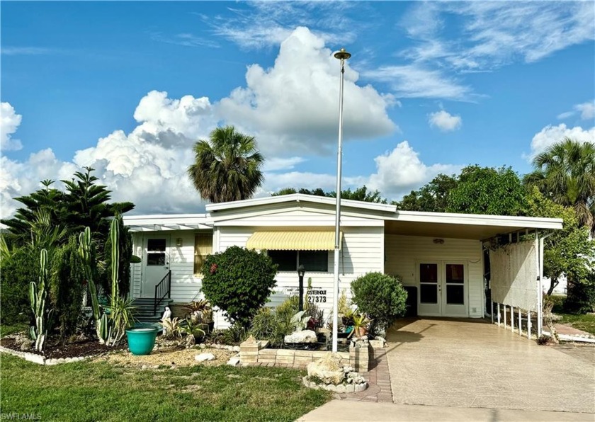 This two bedroom, two bathroom turnkey home has so much to - Beach Home for sale in Bonita Springs, Florida on Beachhouse.com