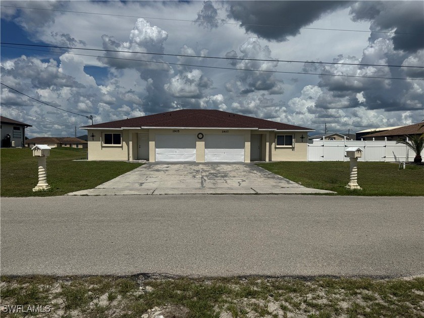 Discover an exceptional dual-unit investment sanctuary where - Beach Home for sale in Lehigh Acres, Florida on Beachhouse.com