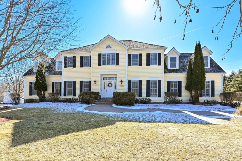 Charming 5 Bed/3.5 bath Colonial blends classic style with a - Beach Home for sale in Mequon, Wisconsin on Beachhouse.com