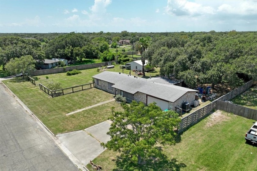 This charming property, set on over half an acre, offers a - Beach Home for sale in Aransas Pass, Texas on Beachhouse.com