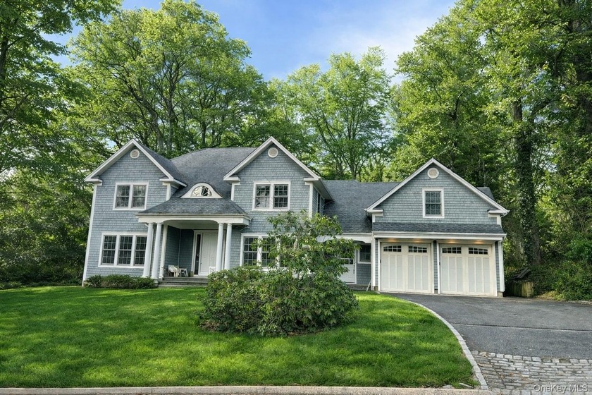 Welcome to this stately Center Hall Colonial nestled in the - Beach Home for sale in Sea Cliff, New York on Beachhouse.com