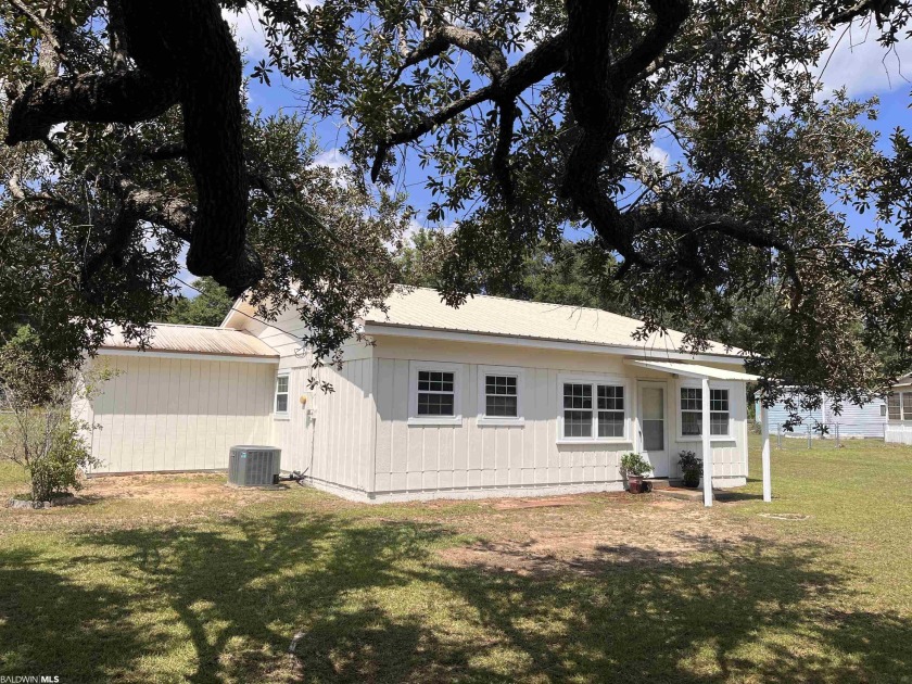 NEW PRICE! Charming coastal cottage with partial OWNERSHIP of - Beach Home for sale in Lillian, Alabama on Beachhouse.com