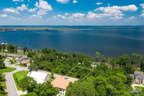 Enjoy this elevated .35 acre direct BAY view lot in the gorgeous - Beach Lot for sale in Pensacola, Florida on Beachhouse.com