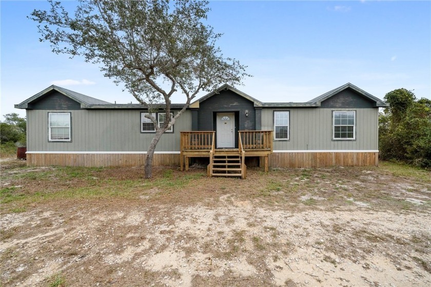 Look at this mobile home situated on over an acre of land - Beach Home for sale in Aransas Pass, Texas on Beachhouse.com