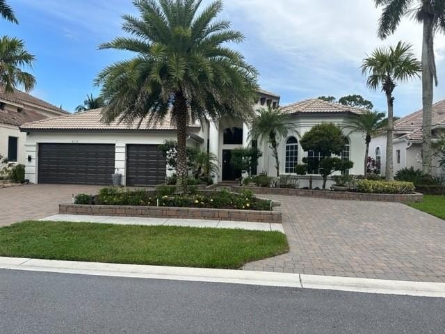 Beautifully maintained single-story 4BR + office home located on - Beach Home for sale in Delray Beach, Florida on Beachhouse.com