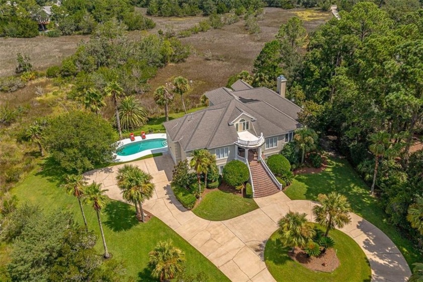 Come see this private oasis on a stunning 1.09 acre marsh-front - Beach Home for sale in Saint Simons, Georgia on Beachhouse.com