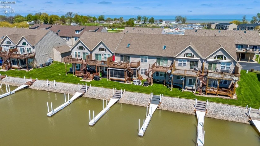Enjoy waterfront living in this updated 2-bed, 1-bath Oak Harbor - Beach Condo for sale in Oak Harbor, Ohio on Beachhouse.com