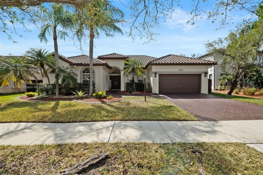 This 5 bedroom 2.5 bath single-story Princeton IV Model - Beach Home for sale in Pembroke Pines, Florida on Beachhouse.com