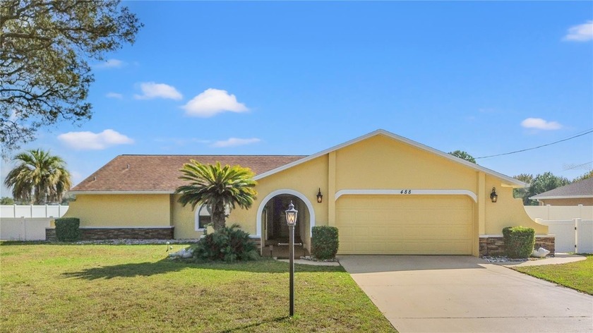 Tucked along the peaceful shores of Balsam Lake, this fully - Beach Home for sale in Spring Hill, Florida on Beachhouse.com