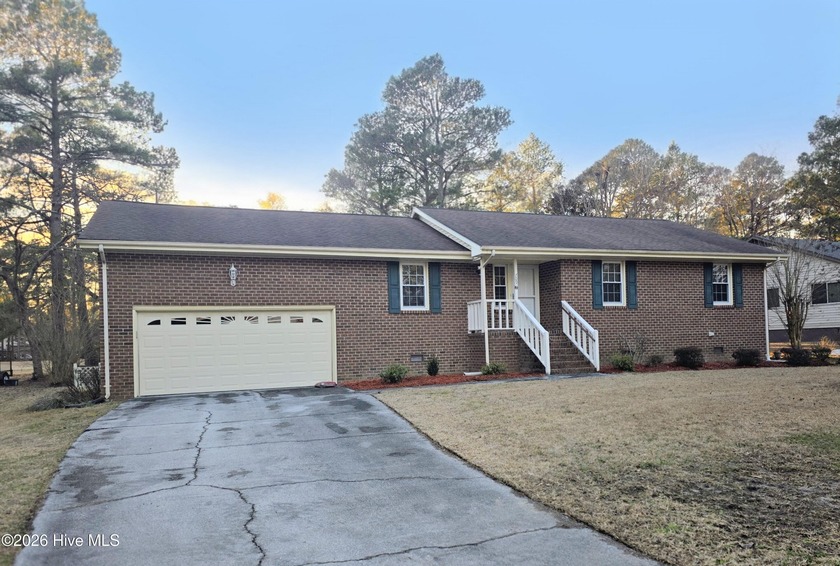 Loads of value in this inviting home backing to River Bend Golf - Beach Home for sale in New Bern, North Carolina on Beachhouse.com