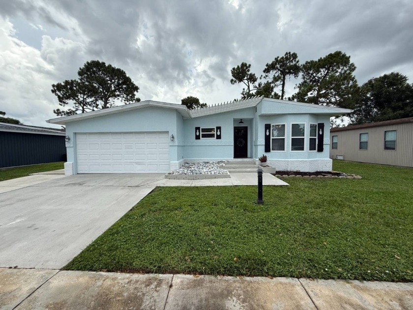 This beautifully updated stucco home is located only steps to - Beach Home for sale in North Fort Myers, Florida on Beachhouse.com