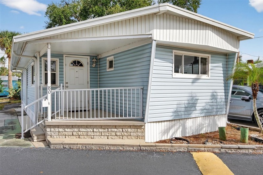 Located in the highly desirable Eagles Nest 55+ resident-owned - Beach Home for sale in St. Petersburg, Florida on Beachhouse.com