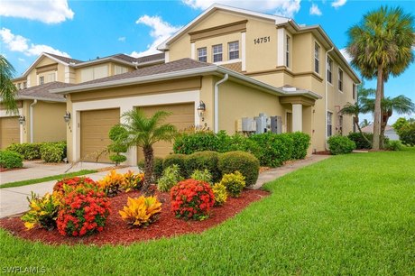 Welcome to this exquisite end-unit coach home, ideally situated - Beach Condo for sale in Fort Myers, Florida on Beachhouse.com