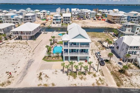 Beautiful Gulf views * 4 BR/ 3.5 BA * Pool * Canal access with - Beach Home for sale in Navarre, Florida on Beachhouse.com