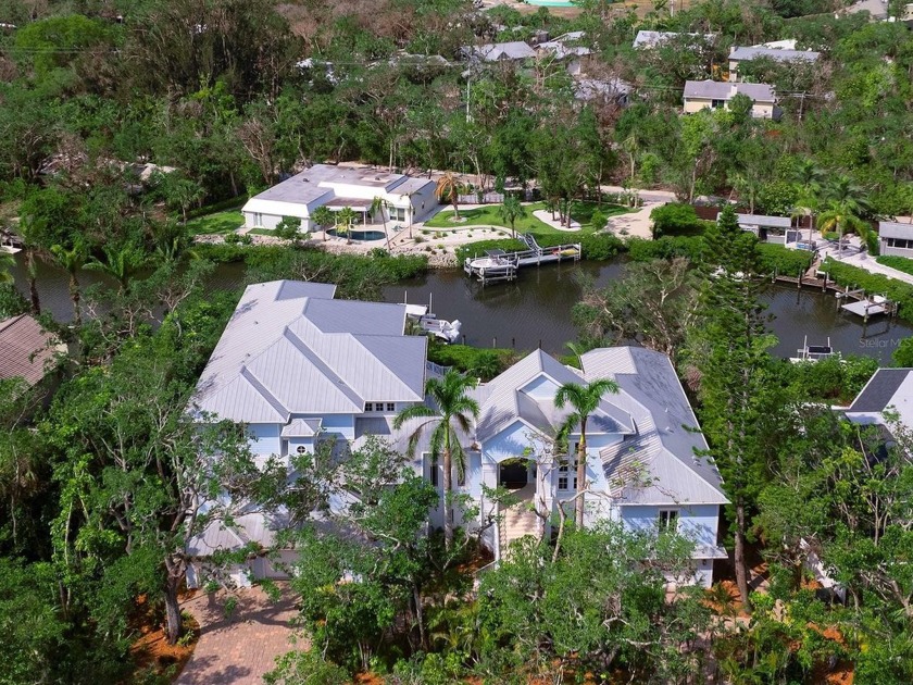 Perfectly positioned along a deepwater canal in the private - Beach Home for sale in Sarasota, Florida on Beachhouse.com