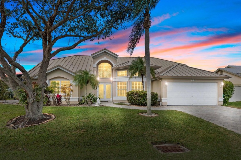 Island living at its finest in sought-after Queens Cove! This - Beach Home for sale in Hutchinson Island, Florida on Beachhouse.com