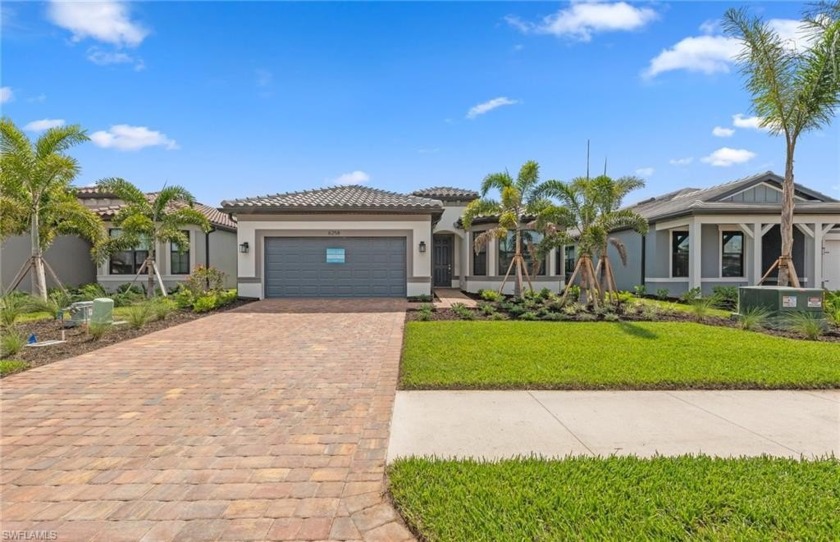 This 2 bed 2 bath + den  Mystique floor plan offers a 2 car - Beach Home for sale in Ave Maria, Florida on Beachhouse.com