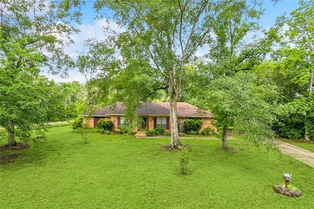 This well maintained four bedroom brick home is situated on a - Beach Home for sale in Slidell, Louisiana on Beachhouse.com