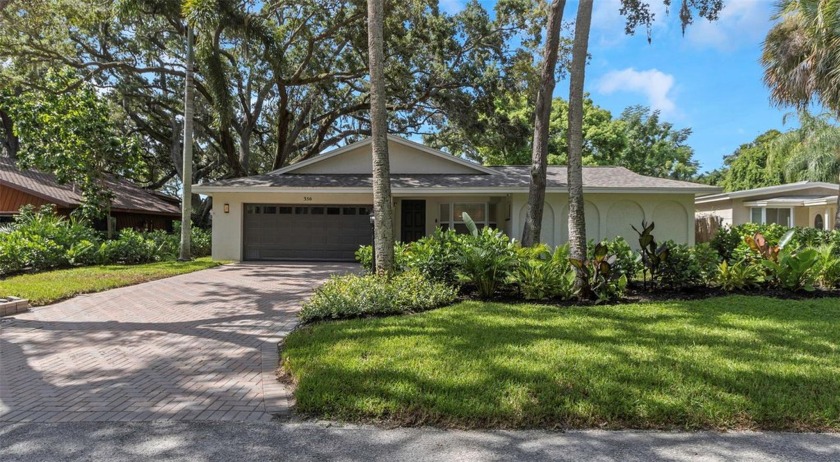 Nestled among the ancient oaks of Safety Harbor and just steps - Beach Home for sale in Safety Harbor, Florida on Beachhouse.com