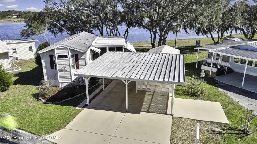 Welcome to paradise! This lakefront home on Tooke Lake is - Beach Home for sale in Weeki Wachee, Florida on Beachhouse.com