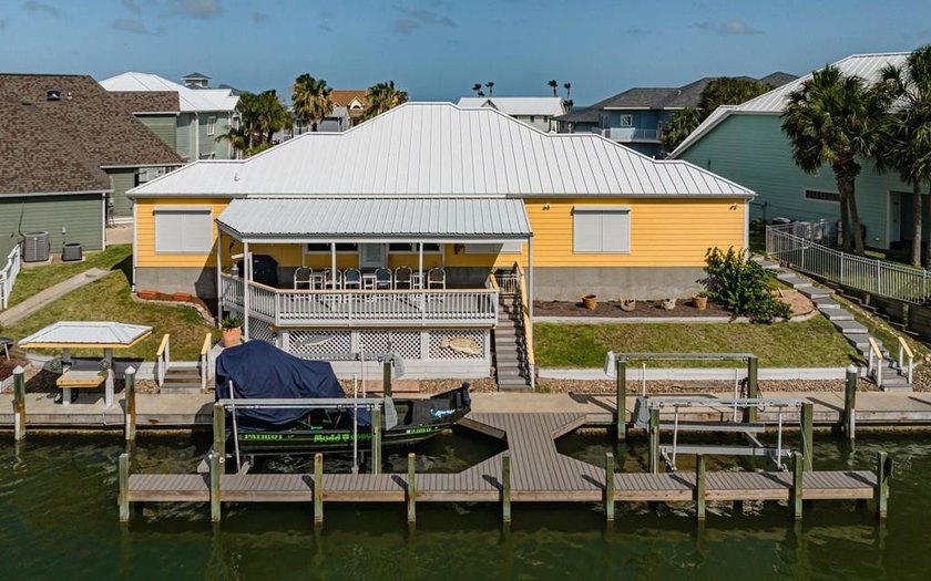 Luxury canal-front living meets laid-back coastal fun in this - Beach Home for sale in Rockport, Texas on Beachhouse.com