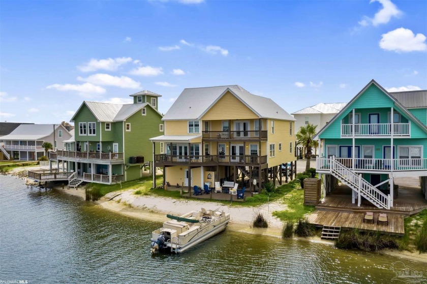 Prime location in Lagoon Pass on a peninsula that alludes to - Beach Home for sale in Gulf Shores, Alabama on Beachhouse.com