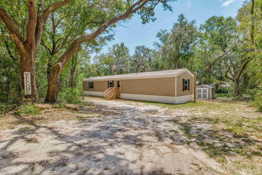 Welcome to your new home sweet home! This charming, newer mobile - Beach Home for sale in Navarre, Florida on Beachhouse.com