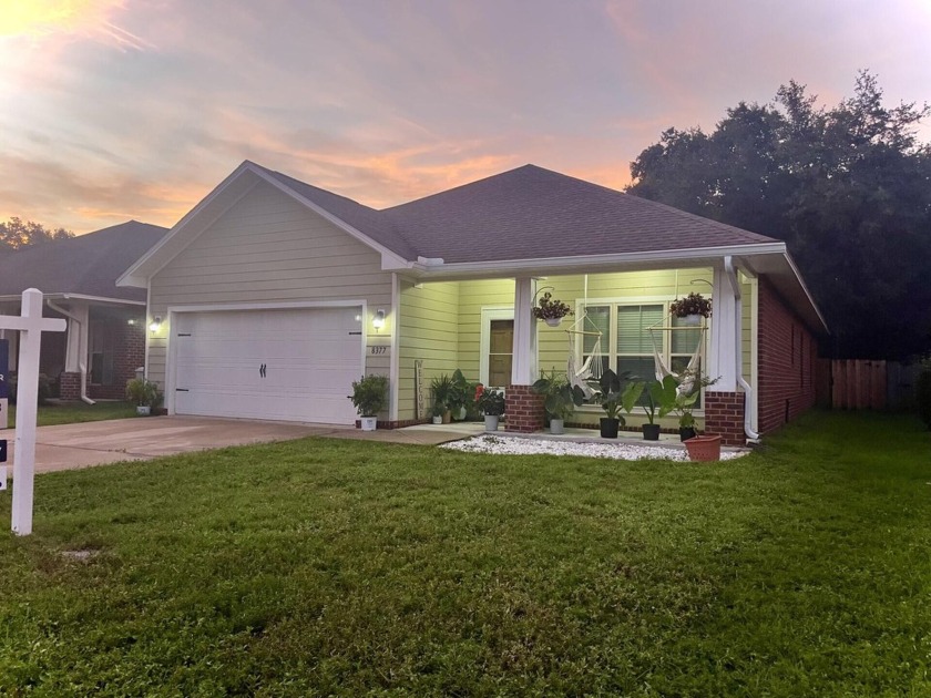 Welcome to this impressive 4 bedroom 2 bath Craftsman style home - Beach Home for sale in Navarre, Florida on Beachhouse.com