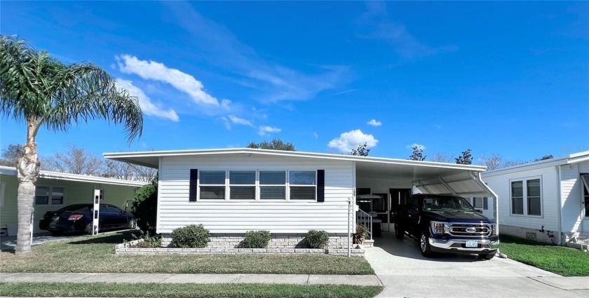 Welcome to this charming 2-bedroom, 2-bath home in the highly - Beach Home for sale in Largo, Florida on Beachhouse.com