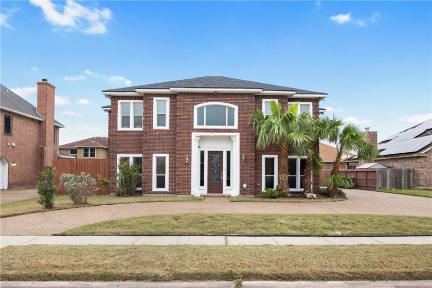 Welcome to 7465 Lake Micala Drive, a beautiful two-story brick - Beach Home for sale in Corpus Christi, Texas on Beachhouse.com