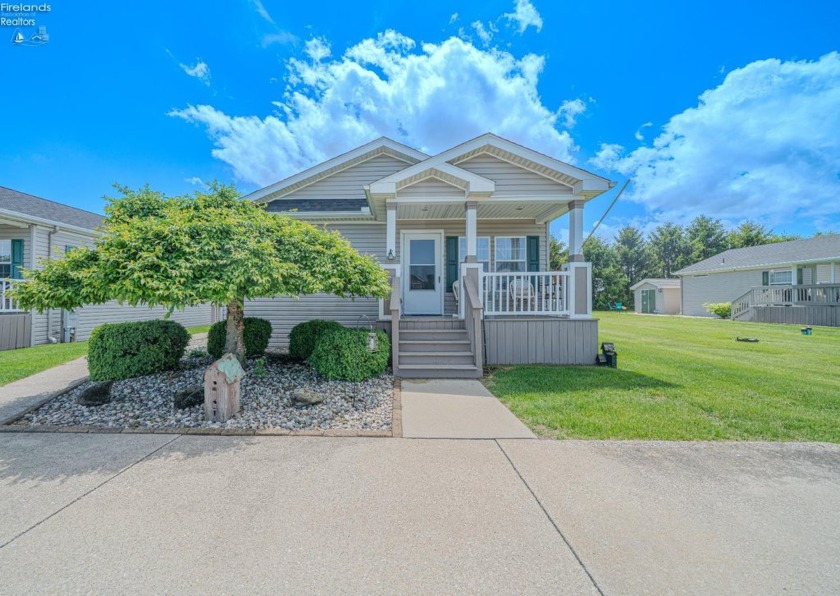 Welcome to this cozy one-story manufactured home nestled in the - Beach Home for sale in Oak Harbor, Ohio on Beachhouse.com