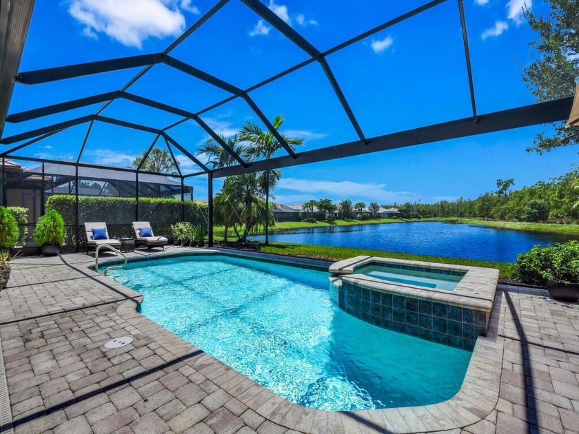 Motivated Seller! Luxurious Lakeside Living in Winding Cypress - - Beach Home for sale in Naples, Florida on Beachhouse.com