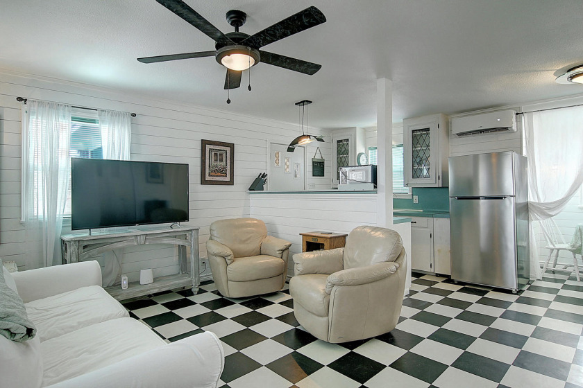 Romantic storybook cottage nestled in the bougainvillea of old - Beach Vacation Rentals in Port Aransas, Texas on Beachhouse.com
