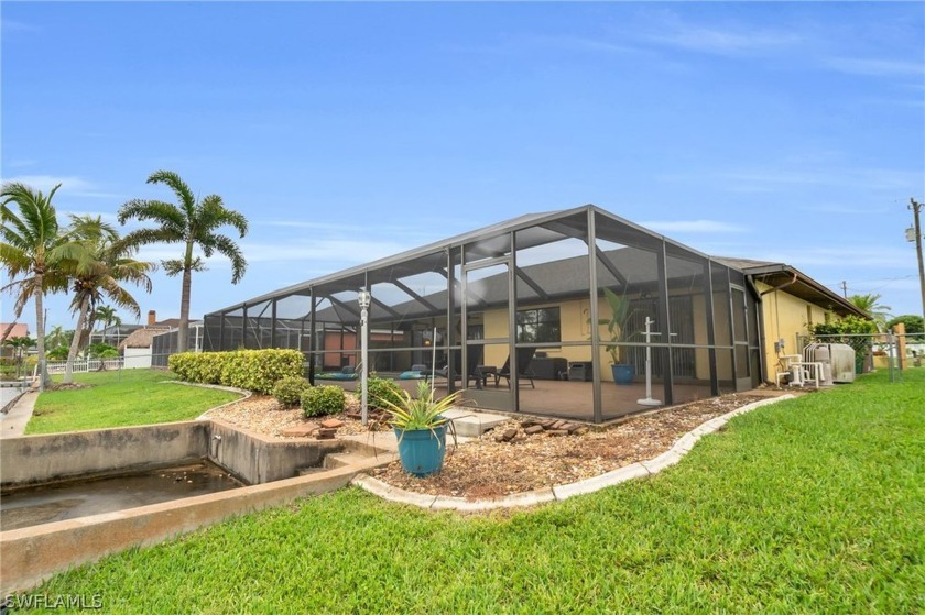 This stunning waterfront home is positioned with an amazing - Beach Home for sale in Cape Coral, Florida on Beachhouse.com