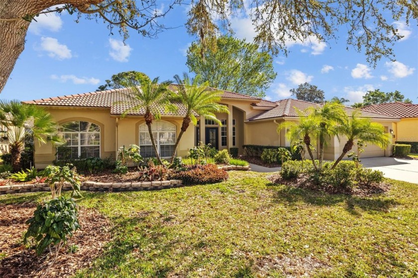 Located in the highly sought-after Crescent Oaks Country Club - Beach Home for sale in Tarpon Springs, Florida on Beachhouse.com
