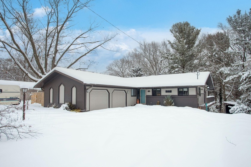 Welcome to 17982 N Fruitport Rd, Spring Lake! This spacious 5 - Beach Home for sale in Spring Lake, Michigan on Beachhouse.com
