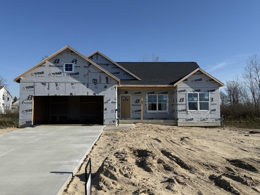 Your brand new ranch home is almost ready for you! This Baldwin - Beach Home for sale in Holland, Michigan on Beachhouse.com