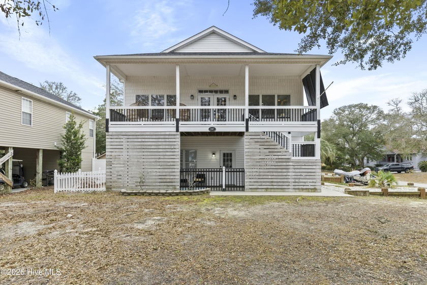 Welcome to a thoughtfully updated coastal getaway, offered - Beach Home for sale in Oak Island, North Carolina on Beachhouse.com