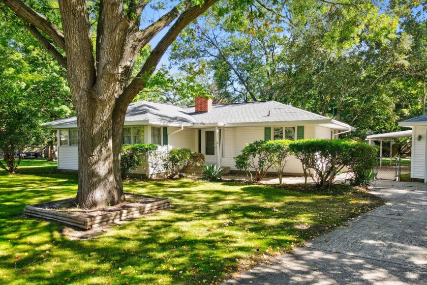 This charming 3-bedroom, 1-bathroom home is nestled in the - Beach Home for sale in Norton Shores, Michigan on Beachhouse.com