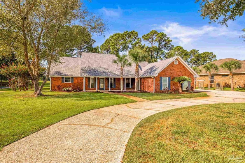 Come see this beautiful 3 bedroom pool home on the 15th hole of - Beach Home for sale in Gulf Breeze, Florida on Beachhouse.com