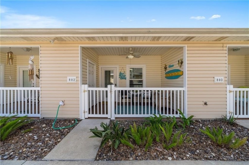 This tropical chic one-story townhome is centrally located on - Beach Townhome/Townhouse for sale in Corpus Christi, Texas on Beachhouse.com