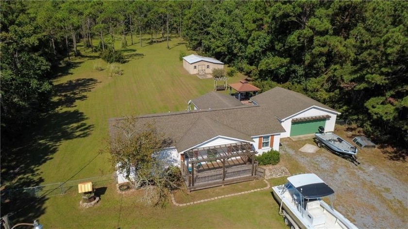 Welcome to this beautiful 3-bedroom, 2-bath home offering 1,448 - Beach Home for sale in Coden, Alabama on Beachhouse.com