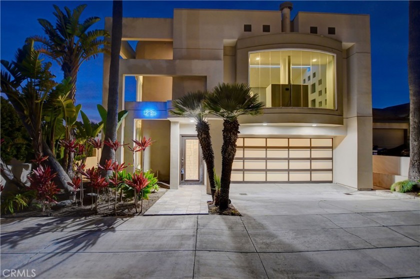 Stunning ocean and sunset views can be seen from the two story - Beach Home for sale in Hermosa Beach, California on Beachhouse.com
