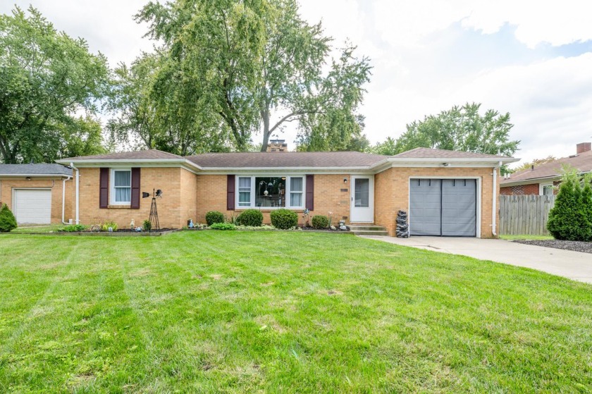 This charming solid brick ranch is the perfect place to call - Beach Home for sale in Benton Harbor, Michigan on Beachhouse.com