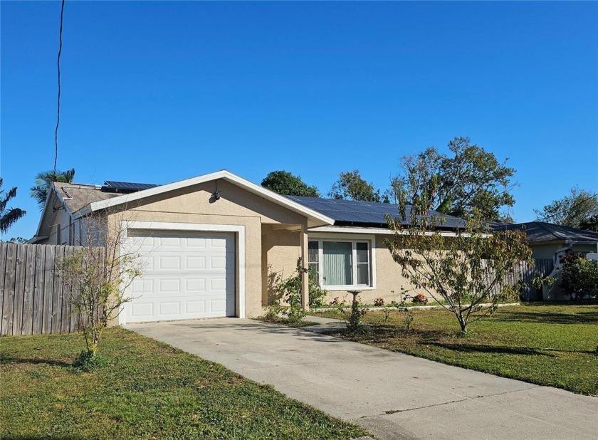 Welcome to your new lakefront retreat complete with an inviting - Beach Home for sale in Pinellas Park, Florida on Beachhouse.com