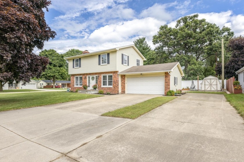 Stunning Colonial-style home nestled in the highly sought-after - Beach Home for sale in Port Huron, Michigan on Beachhouse.com