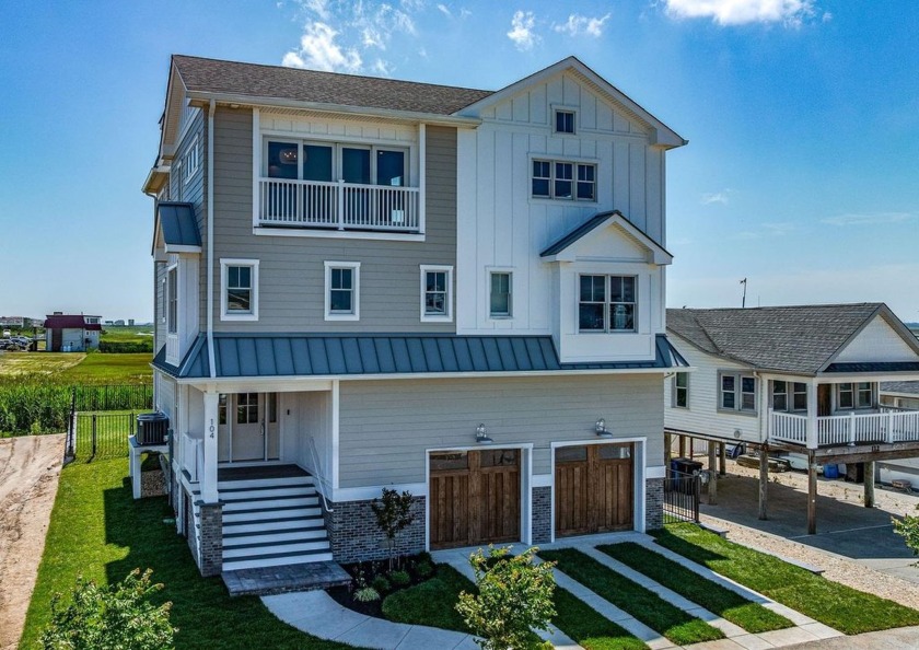 This single-family custom built home offers a level of island - Beach Home for sale in Strathmere, New Jersey on Beachhouse.com